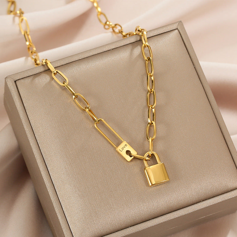 gold lock necklace, paperclip chain necklace